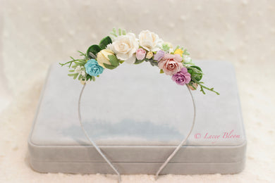 Floral hairband on metal hairband.