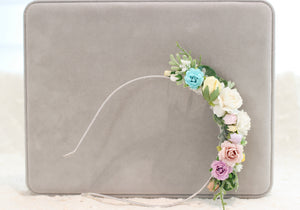 Floral hairband on metal hairband.